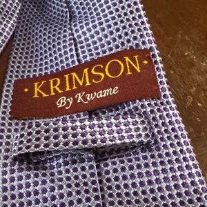 Beautiful heavy 100% hand made silk tie. Krimson by Kwame Purple pattern